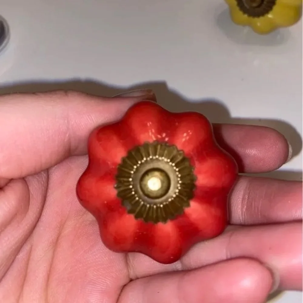 Pier 1 Drawer knobs set of 8 2 in each color( white,yellow, red, blue)